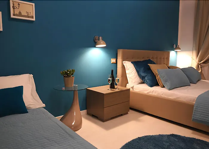 Le Coq Suites Roma