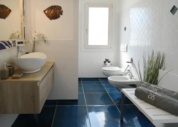 Stanza in Villa Amaca angolo di paradiso piscina riscaldata e sauna raggi infrarossi Arzachena